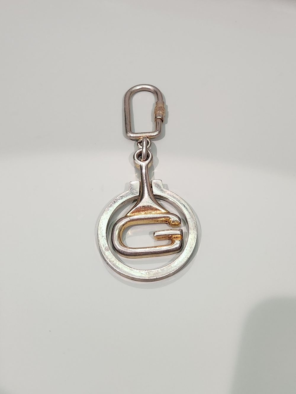 Gucci Two-Tone Silver and Gold G Logo Keychain